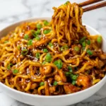 Nouilles au poulet collantes à l’ail